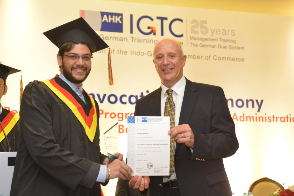 16 (6) Kuntal Modi from PGPBA Batch 2015-2017 receives his certificate from Dr. Juergen Morhard, Consul General, German Consulate General